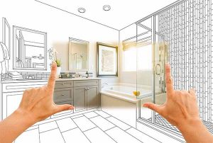 Custom home builders in ocean county, schematic of bathroom framed by persons hands